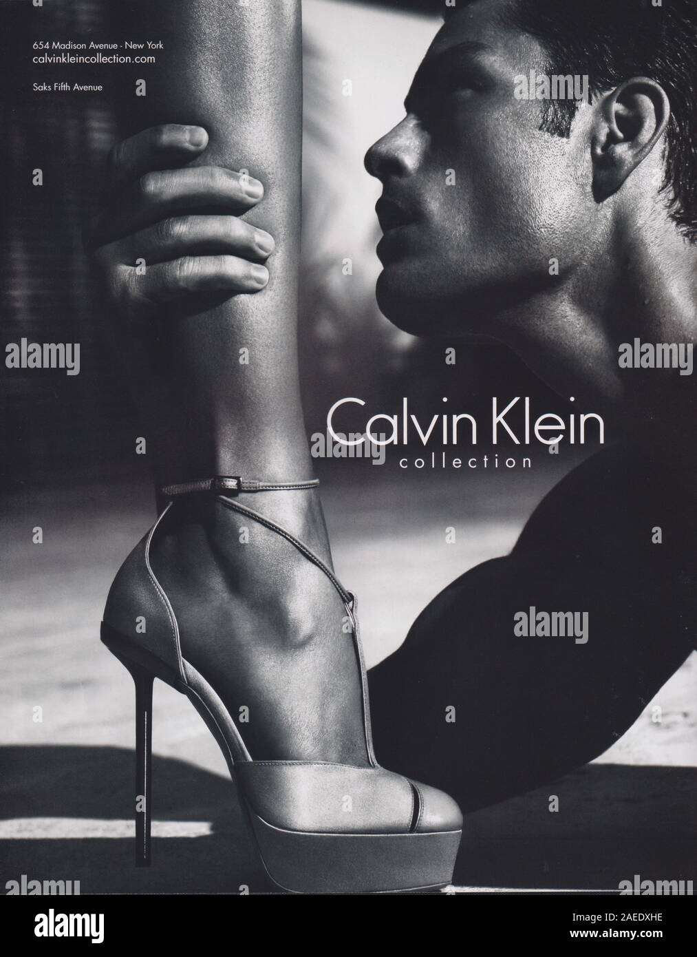 poster advertising Calvin Klein fashion house with Lara Stone, Tyson Ballou in paper magazine from 2012, advertisement, creative CK 2010s advert Stock Photo