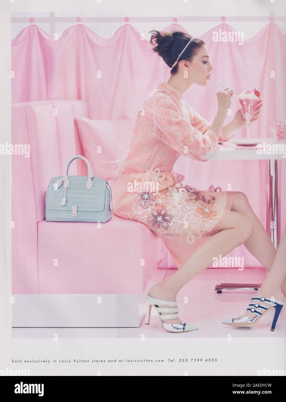 poster advertising Louis Vuitton handbag in paper magazine from 2012 year,  advertisement, creative LV Louis Vuitton advert from 2010s Stock Photo -  Alamy