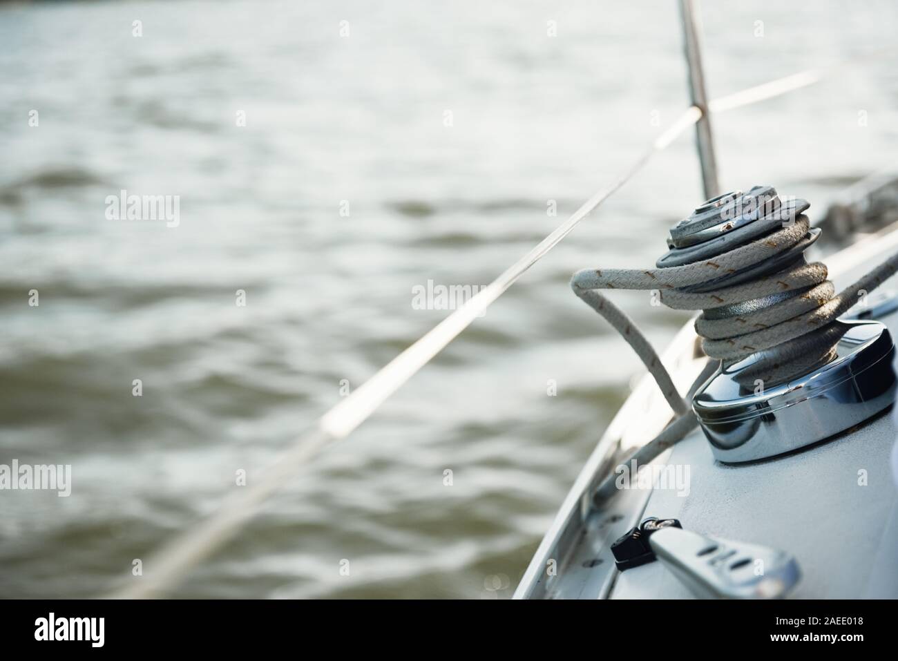 Sailboat winch and rope yacht detail. sunny day Stock Photo