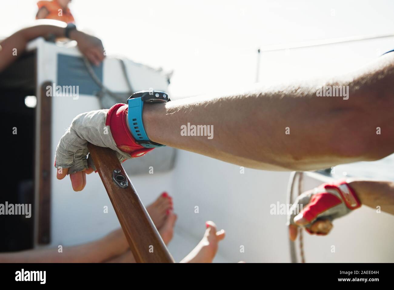 Hand on the steering yacht wheel. Sunny day Stock Photo