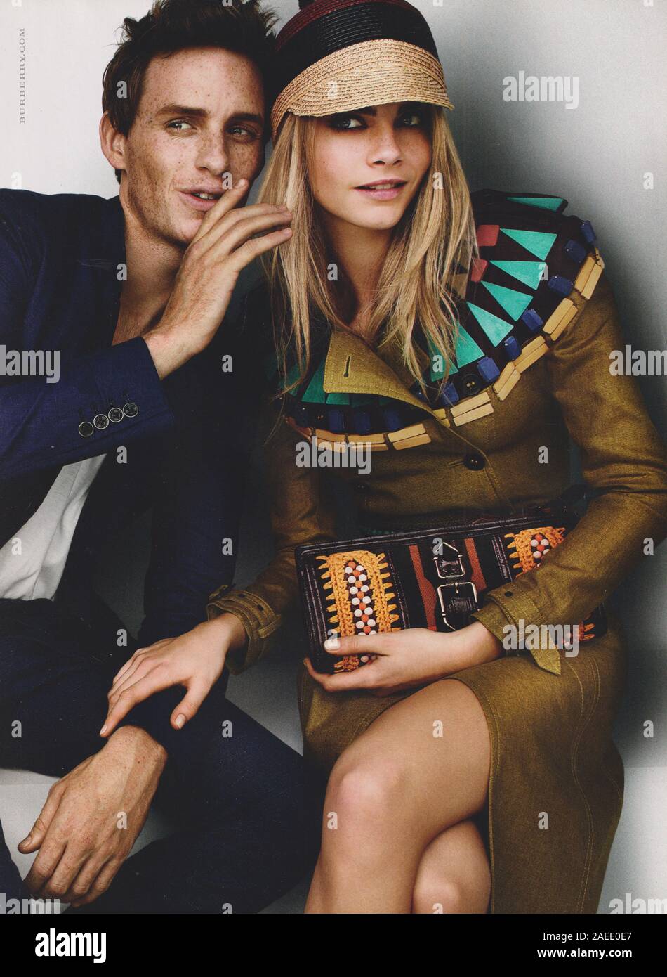 poster advertising Burberry fashion house with Cara Delevingne, Eddie  Redmayne in magazine from 2012, advertisement, creative Burberry 2010s  advert Stock Photo - Alamy