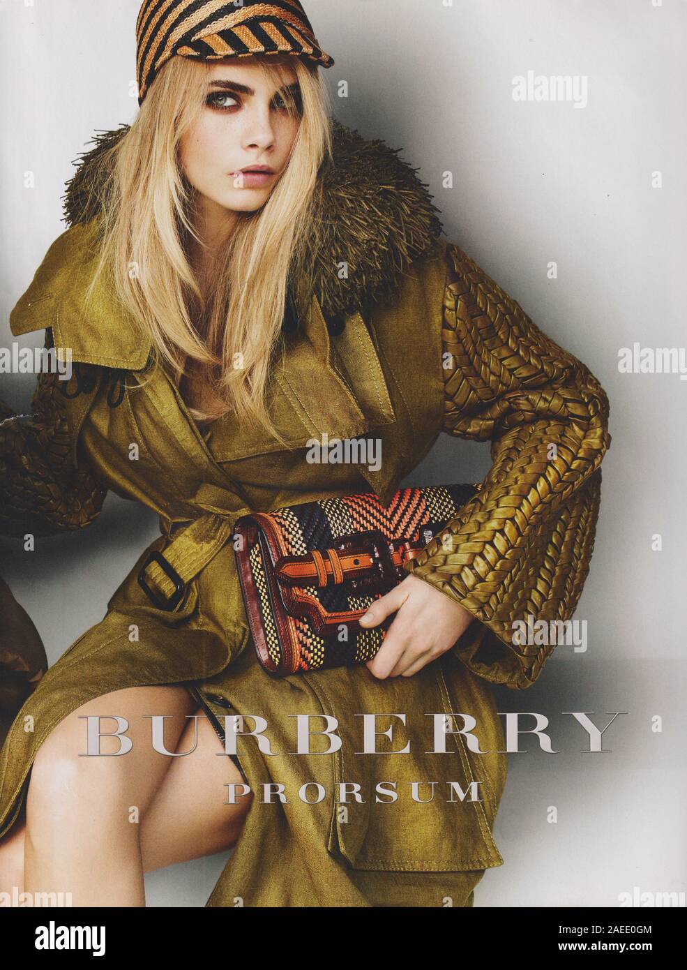 poster advertising Burberry fashion house with Cara Delevingne in paper  magazine from 2012 year, advertisement, creative Burberry advert from 2010s  Stock Photo - Alamy