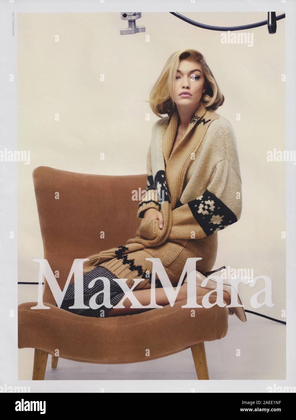 poster advertising Max Mara with Gigi Hadid in paper magazine from 2015  year, advertisement, creative MaxMara advert from 2010s Stock Photo - Alamy