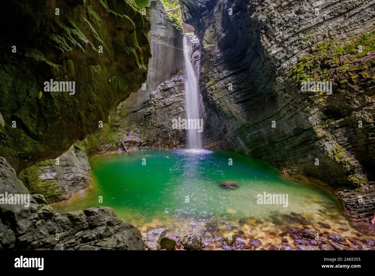 Hidden waterfall in the mountain canyon with crystal clear emerald water.  Koziak waterfall in Soca valley, Slovenia Stock Photo - Alamy