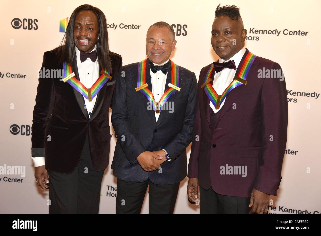Washington, United States. 08th Dec, 2019. 2019 Kennedy Center Honorees Earth, Wind & Fire band members (L-R) Verdine White, Ralph Johnson and Philip Bailey, all 68, pose for photographers as they arrive for a Kennedy Center gala performance, in Washington, Sunday, December 8, 2019. Photo by Mike Theiler/UPI Credit: UPI/Alamy Live News Stock Photo
