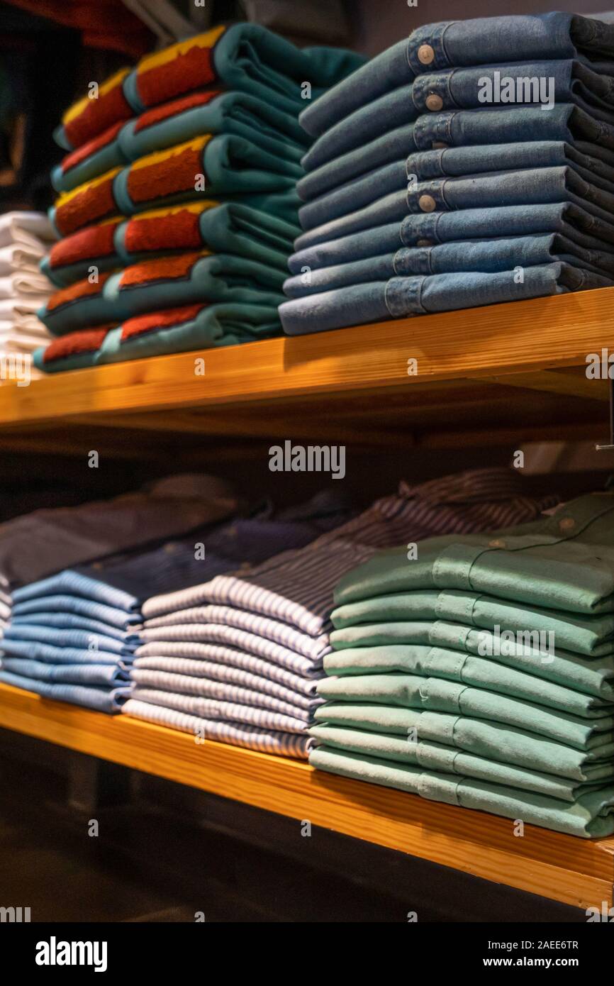 Stack of folded jeans on store shelves hi-res stock photography and ...