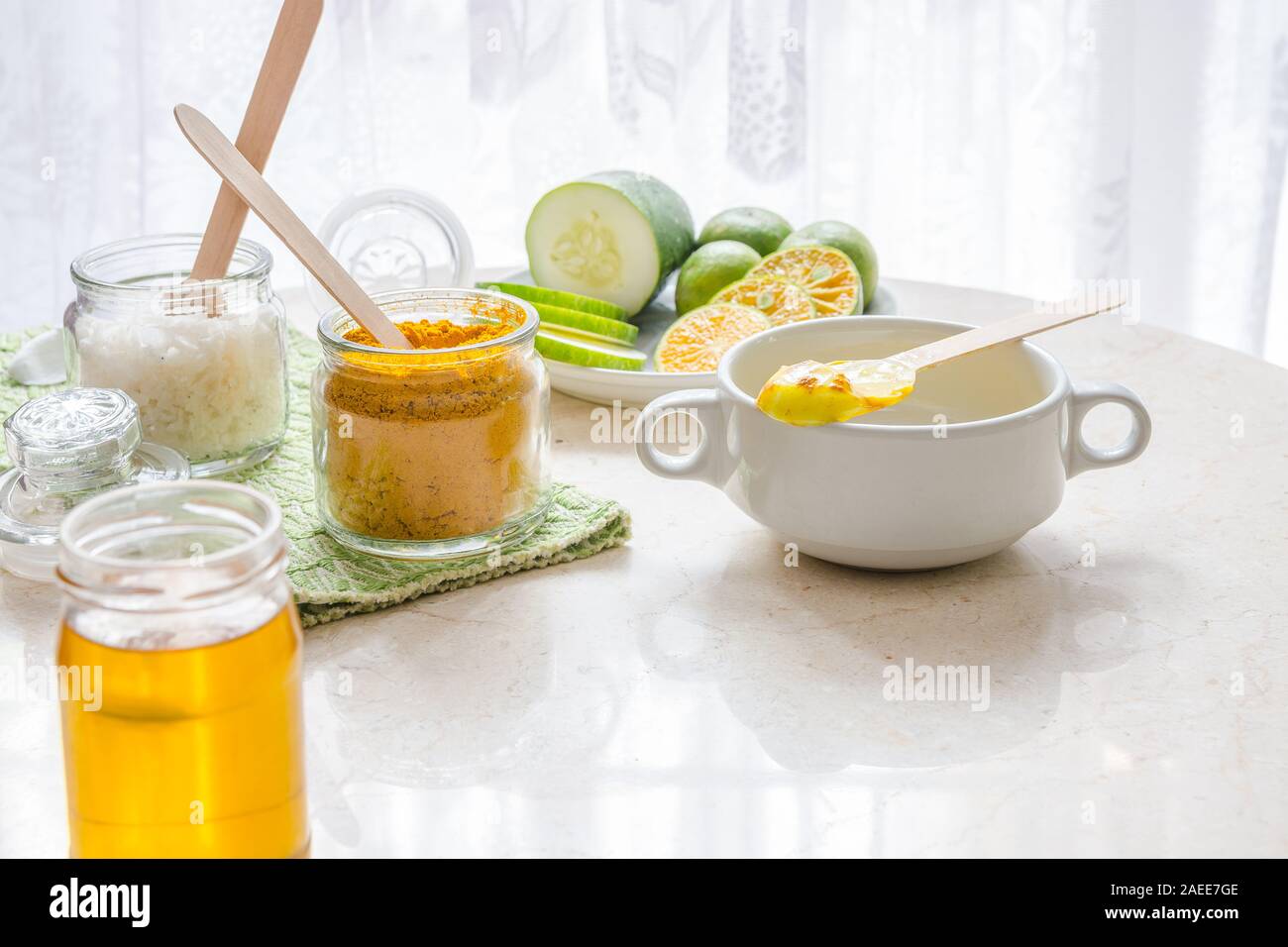making a home made tumeric face cream - alternative medicine and health care flat lay image with copy space for text. Stock Photo