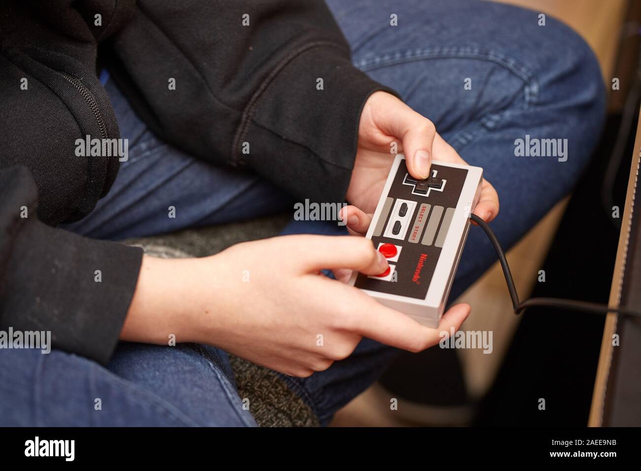 Nintengo NES,playing Super Mario 3 Stock Photo