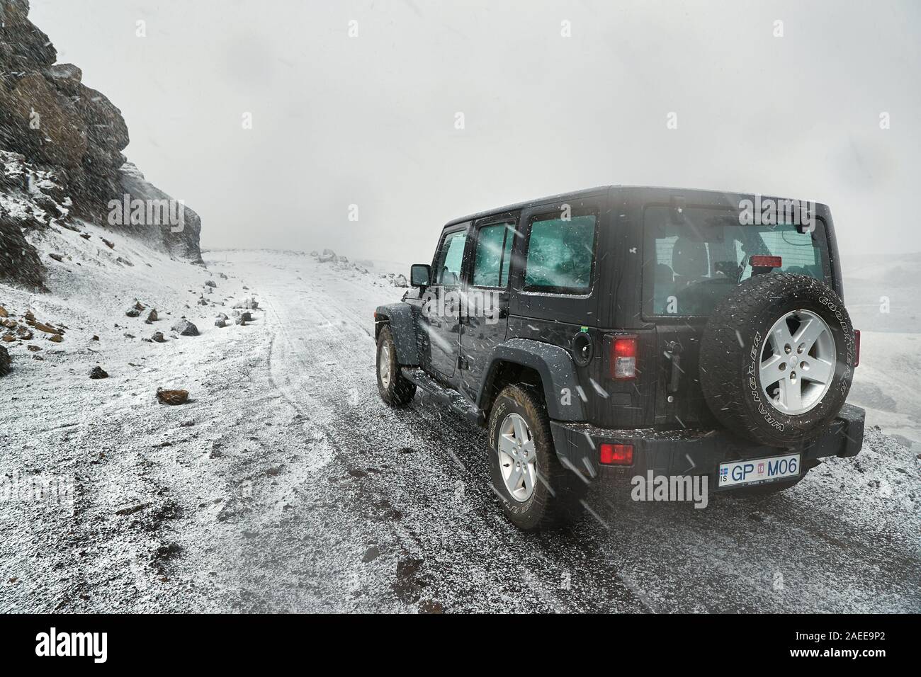 Jeep Wrangler on Icelandic terrain with snow Stock Photo