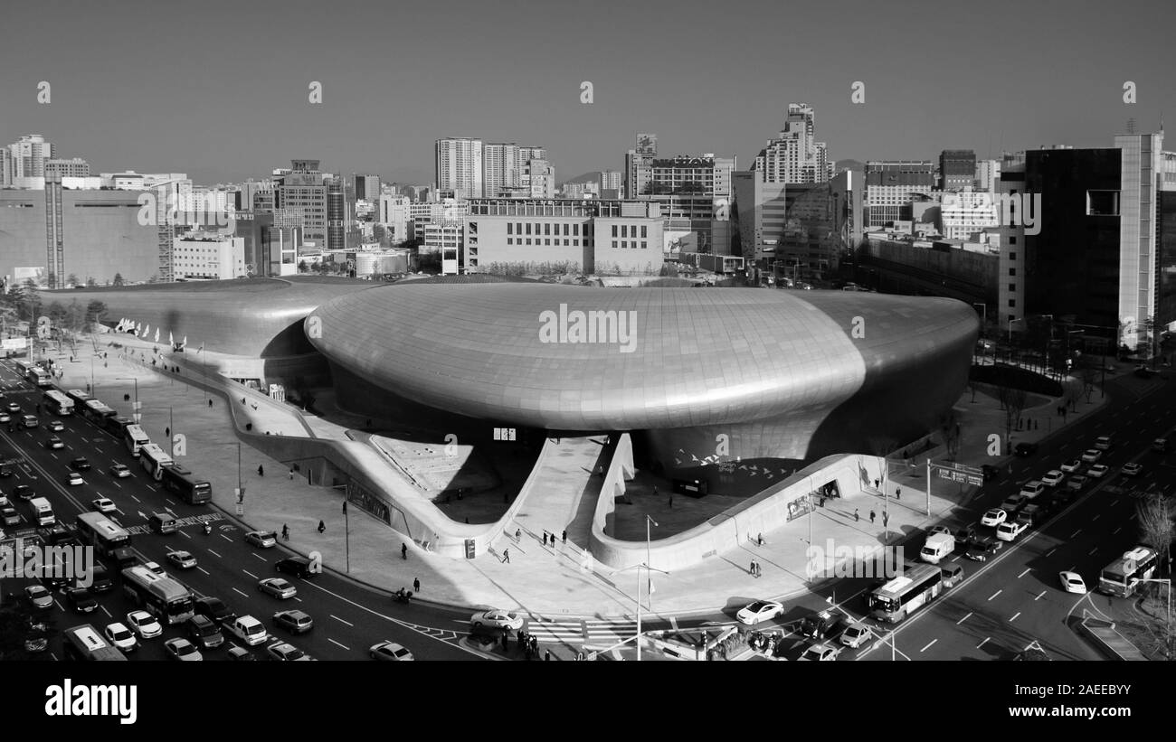 DEC 11, 2015 Seoul, South Korea - Dongdaemun design plaza or DDP modern free from building architecture in black and white arial view with busy traffi Stock Photo