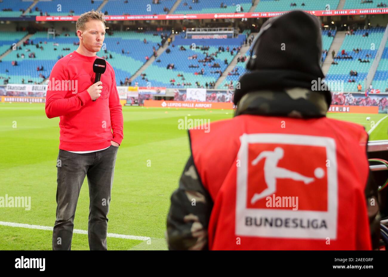 Leipzig, Germany. 07th Dec, 2019. Soccer: Bundesliga, 14th matchday, RB  Leipzig - 1899 Hoffenheim in the Red Bull Arena Leipzig. Leipzig's coach  Julian Nagelsmann comes to Sky's TV interview before the match
