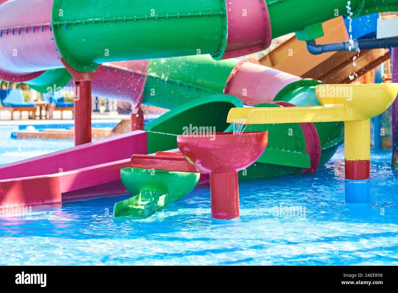Colorful water slides in aqua park, close up Stock Photo
