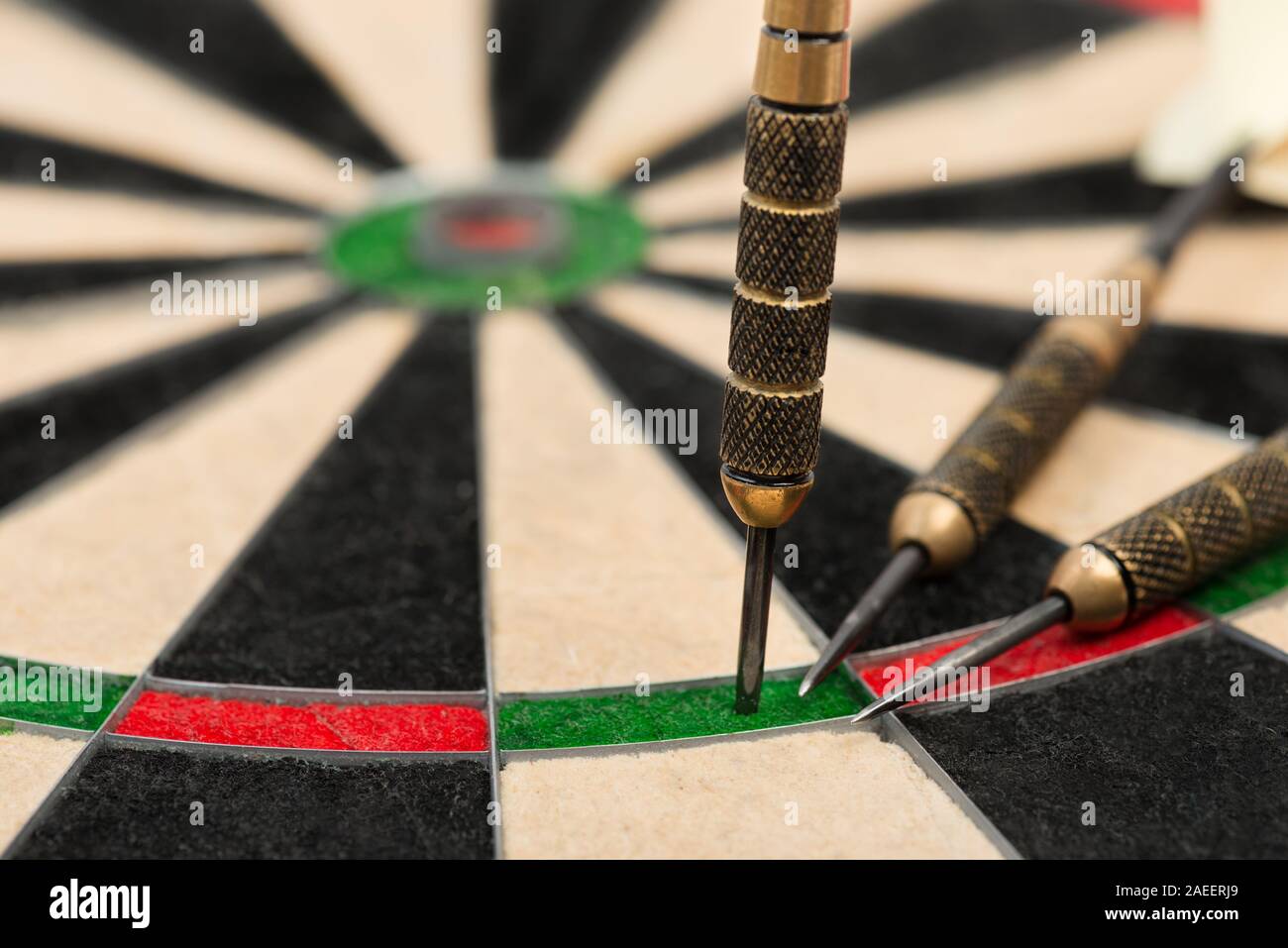 Dartboard with arrows close up Stock Photo