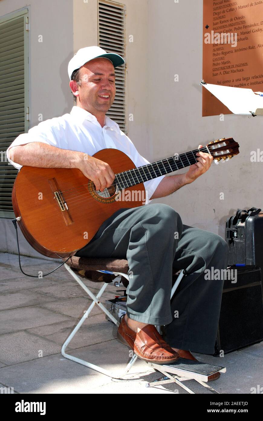 Man playing spanish guitar singing hi res stock photography and