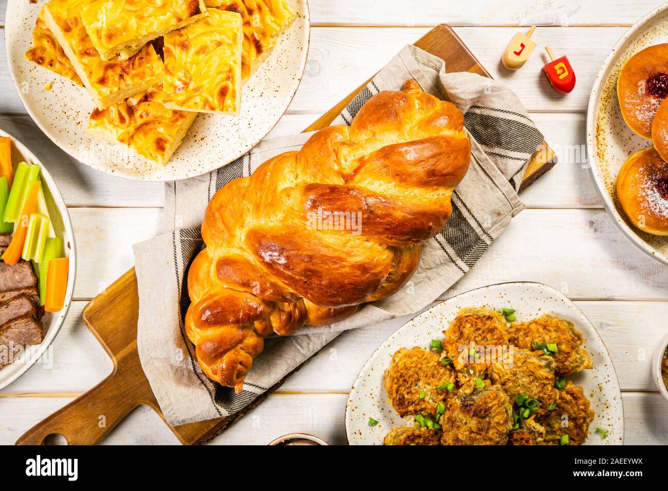 Selection of traditional hanukkah food for festive dinner, wood background Stock Photo