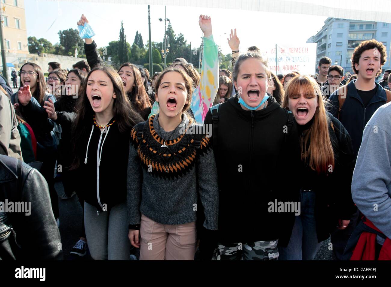 Students take part in a rally   during the anniversary of the police's fatal shooting of a teenage boy that caused extensive rioting in 2008. Stock Photo