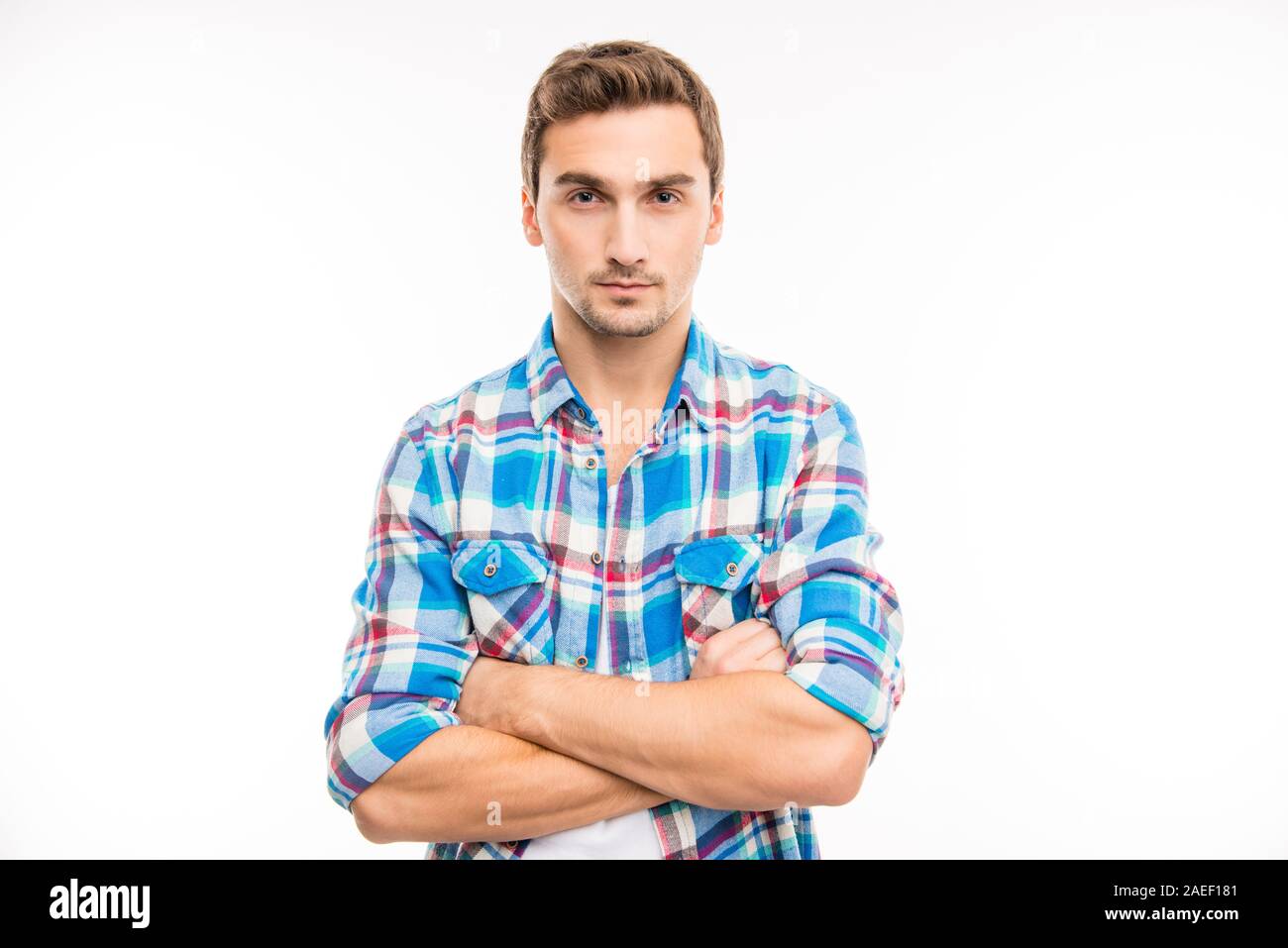 Young cute handsome man crossing hands Stock Photo Alamy