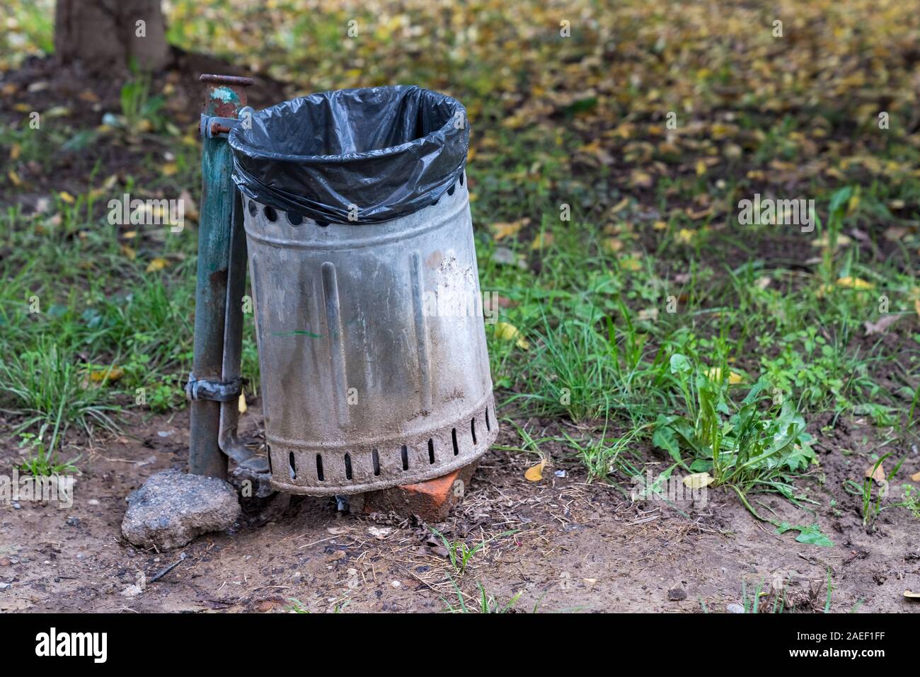 Older dumpster of garbage empty close up Stock Photo Alamy