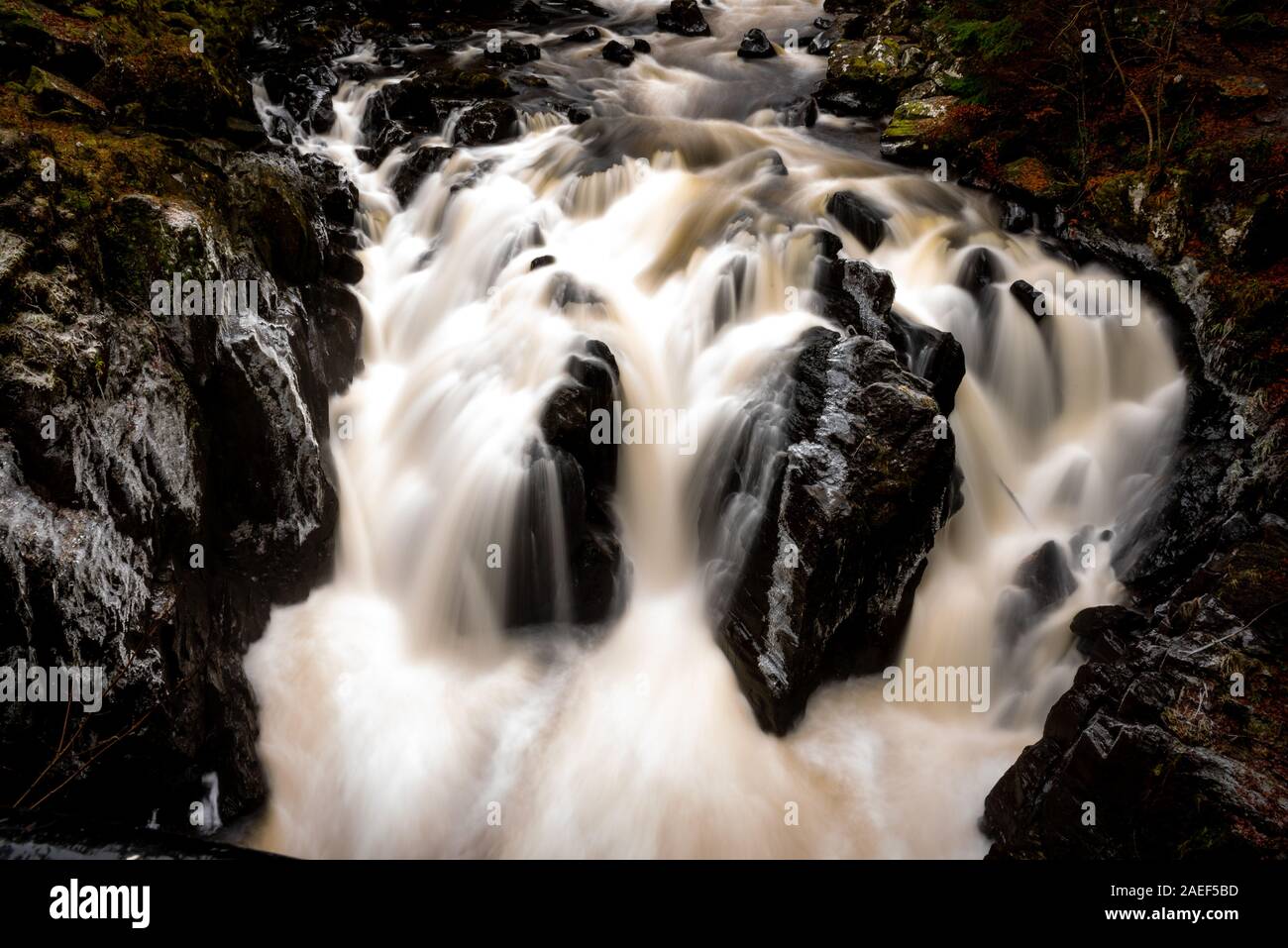 Frozen stones in Highland river Stock Photo
