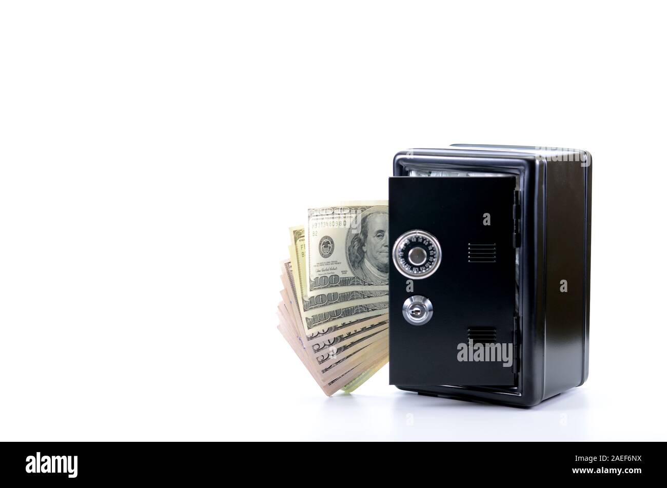 Saving your money , steel safe with money, over white background, money insurance concept Stock Photo