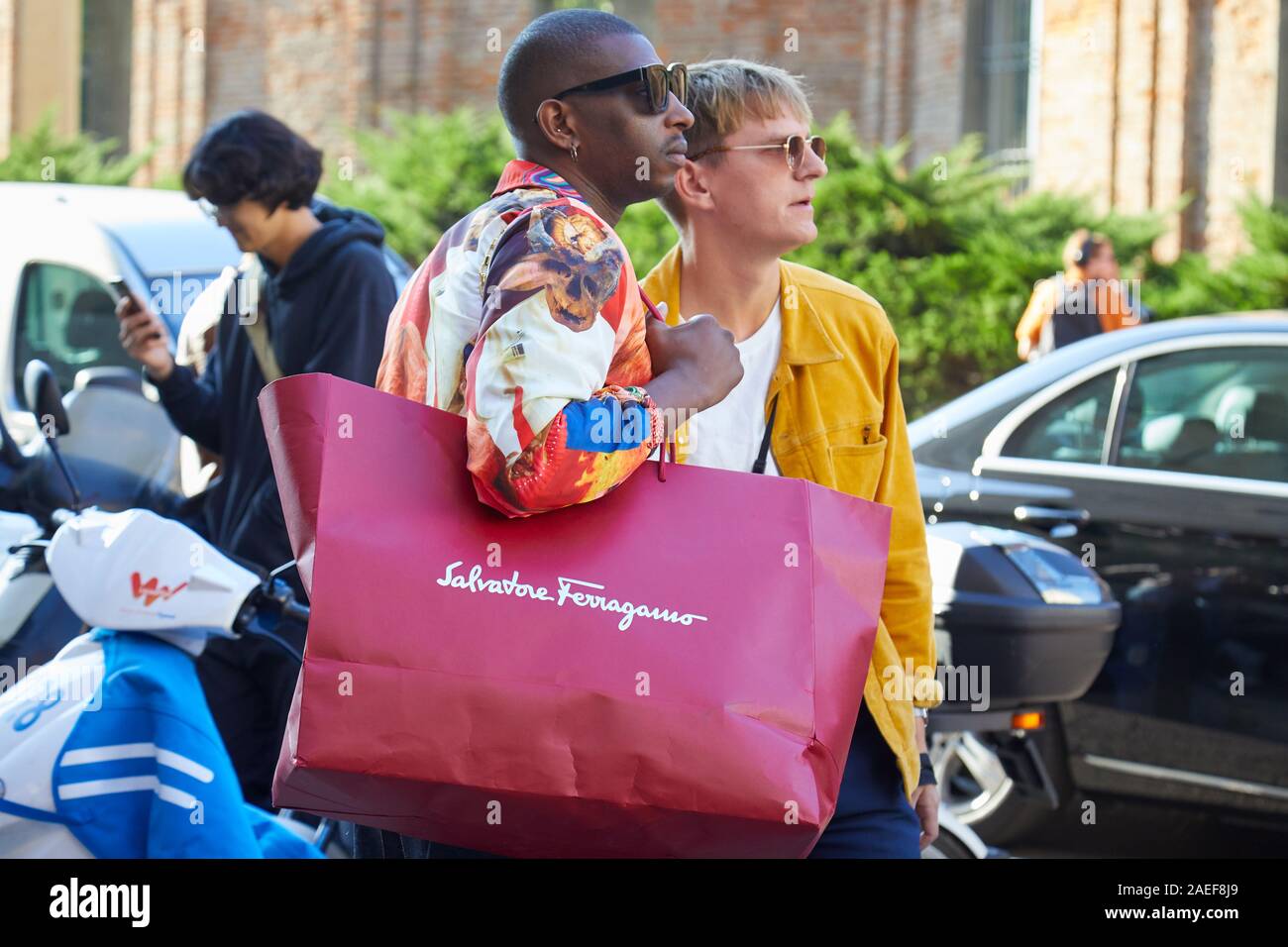 MILAN - SEPTEMBER 23: Man with Gucci shoes and Louis Vuitton bag before  Gabriele Colangelo fashion show, Milan Fashion Week street style on  September Stock Photo - Alamy