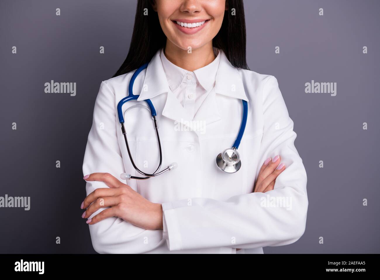 Cropped photo of brown hair experienced girl doctor work in hospital cross  hands ready consult patients wear stethoscope white coat isolated over grey  Stock Photo - Alamy