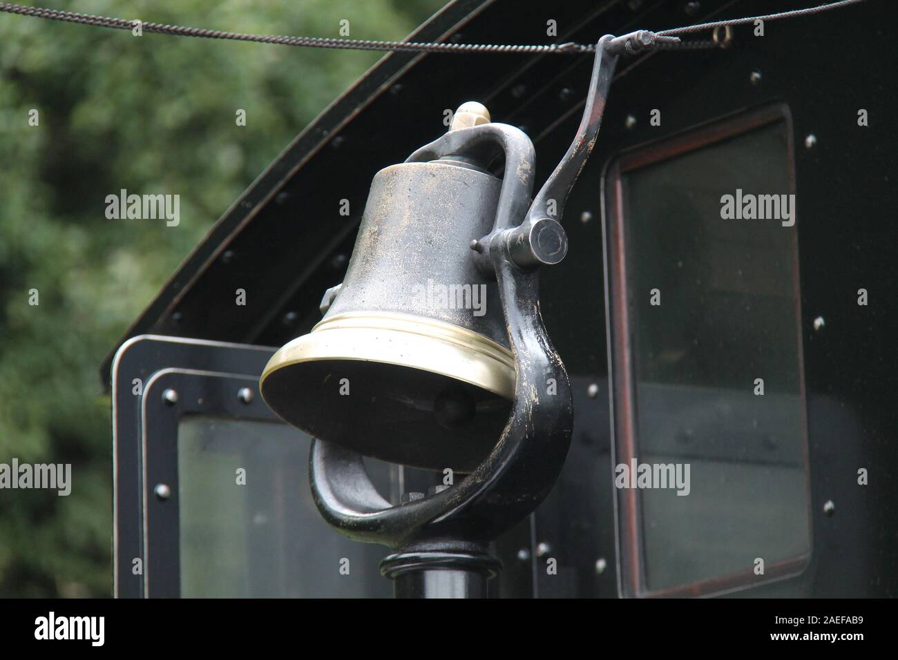 A Brass Metal Bell on a Vintage Steam Train Engine Stock Photo Alamy