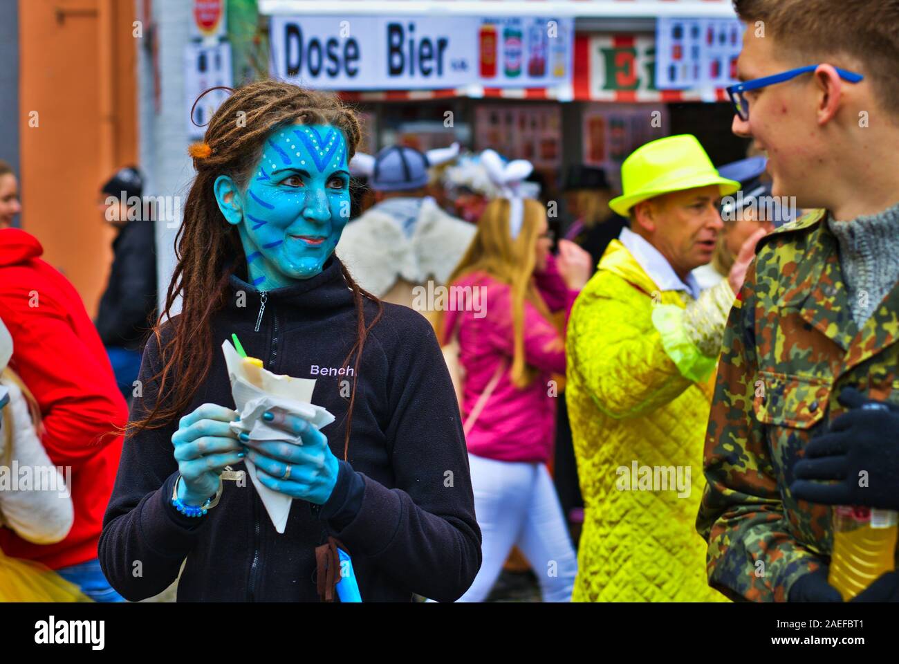 Real costumed people in carnival costume celebrating the opening of the 2020 season in Cologne, Germany, Stock Photo