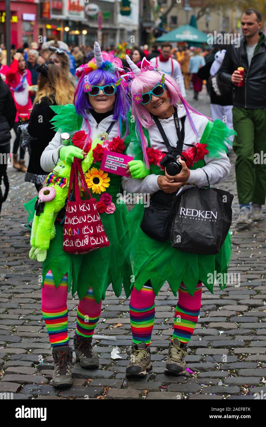 Real costumed people in carnival costume celebrating the opening of the 2020 season in Cologne, Germany, Stock Photo