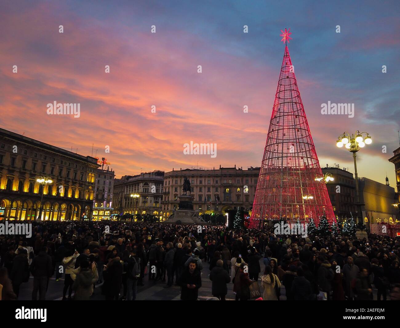 Milan, Italy - December 7, 2019 Crowds of people gathers at Piazza Duomo in Milan to welcome Christmas season Stock Photo