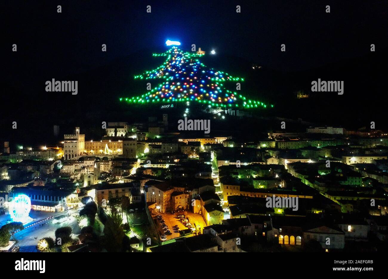 A Christmas Tree Decorates Monte Ingino Which Dominates The City Of Gubbio In The Umbria Region The Tree Is 650 Meters Long With An Area Of About 1 000 Square Meters And Covered