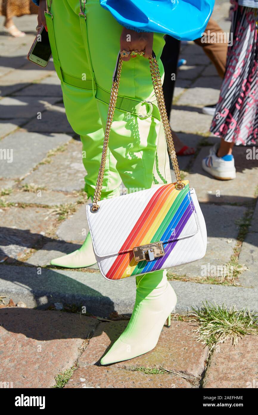 MILAN, ITALY - SEPTEMBER 21, 2019: Woman with green trousers and rainbow  colors Michael Kors bag before Msgm fashion show, Milan Fashion Week street  s Stock Photo - Alamy