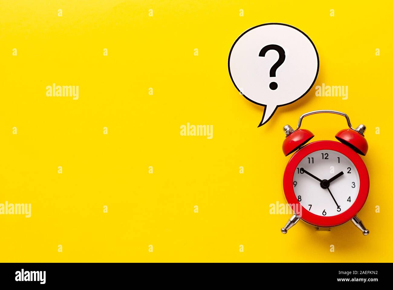Colourful red alarm clock with question mark Stock Photo Alamy