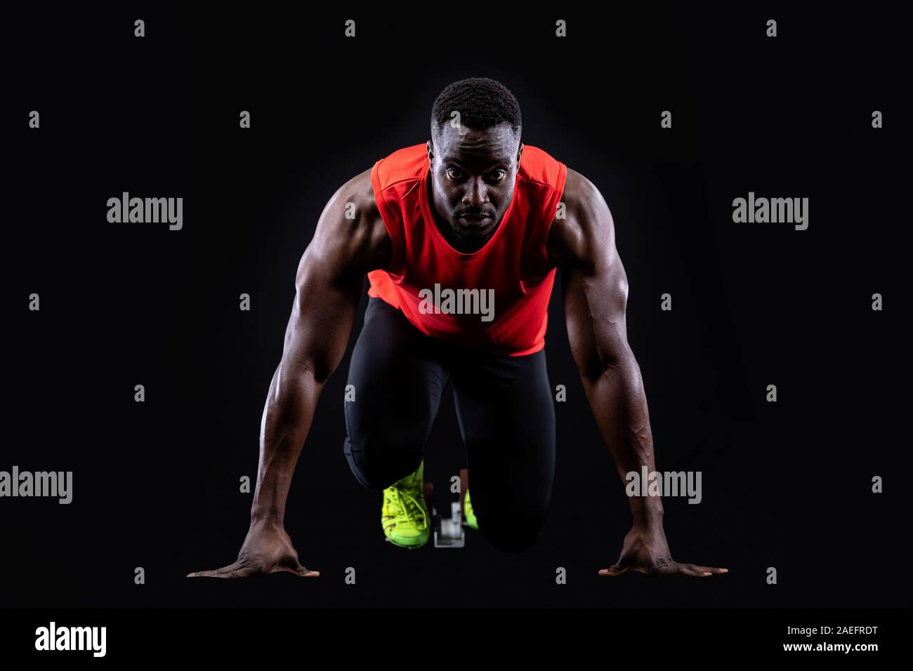 Male runner on starting blocks Stock Photo Alamy