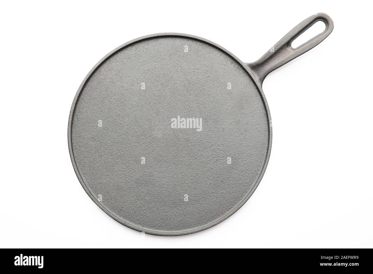 Top View of Seasoned Cast Iron Pan on White Background Stock Photo