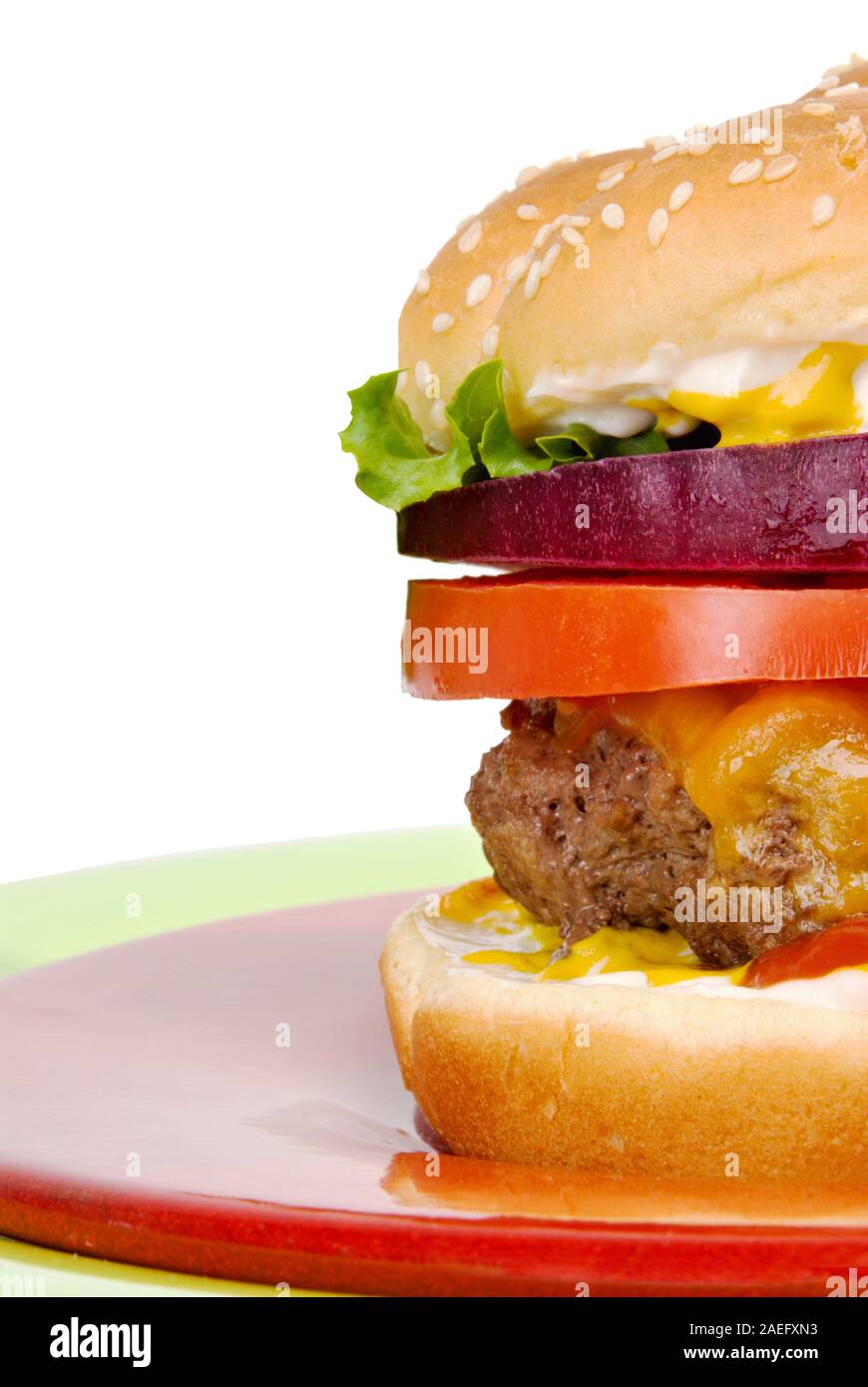 homemade hamburger made with ground beef and melted cheese with all the fixings and copy space. Stock Photo