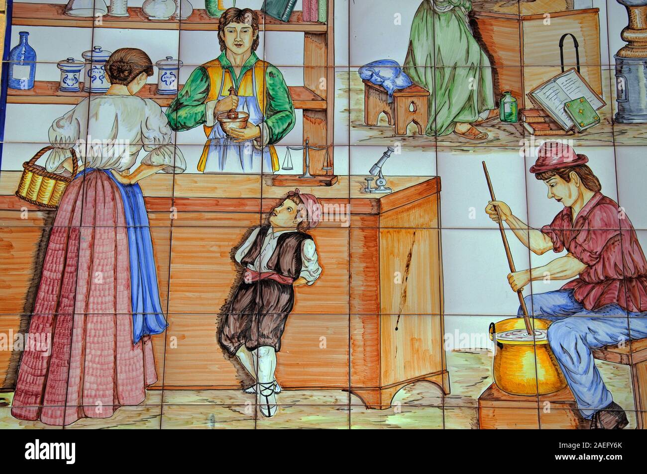 Ceramic tiled picture on the side of a chemist in the town centre, Albox, Almeria Province, Andalucia, Spain, Europe. Stock Photo
