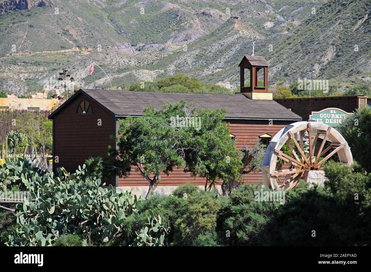 Wooden church building in Fort Apache at Mini Hollywood with mountains to the rear, Tabernas, Almeria Province, Andalucia, Spain. Stock Photo