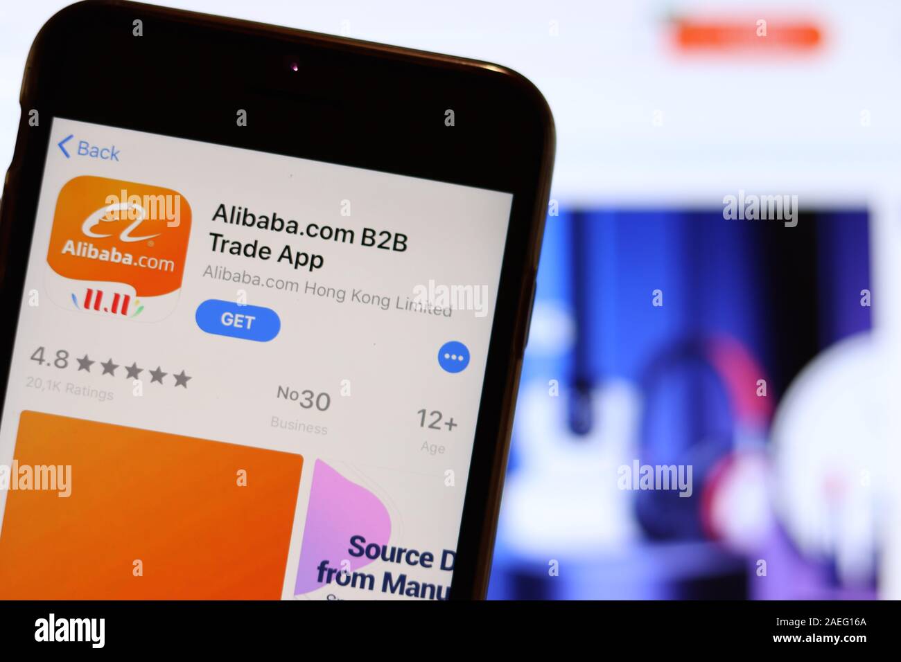 Los Angeles, California, USA - 26 November 2019: Alibaba Trade App icon on phone screen with logo on blurry background, Illustrative Editorial. Stock Photo