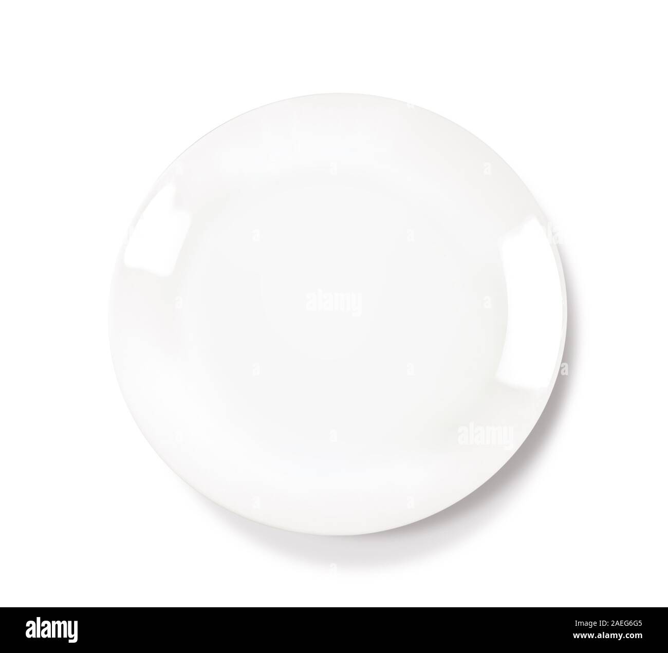 Empty ceramic round plate isolated on white background Stock Photo - Alamy