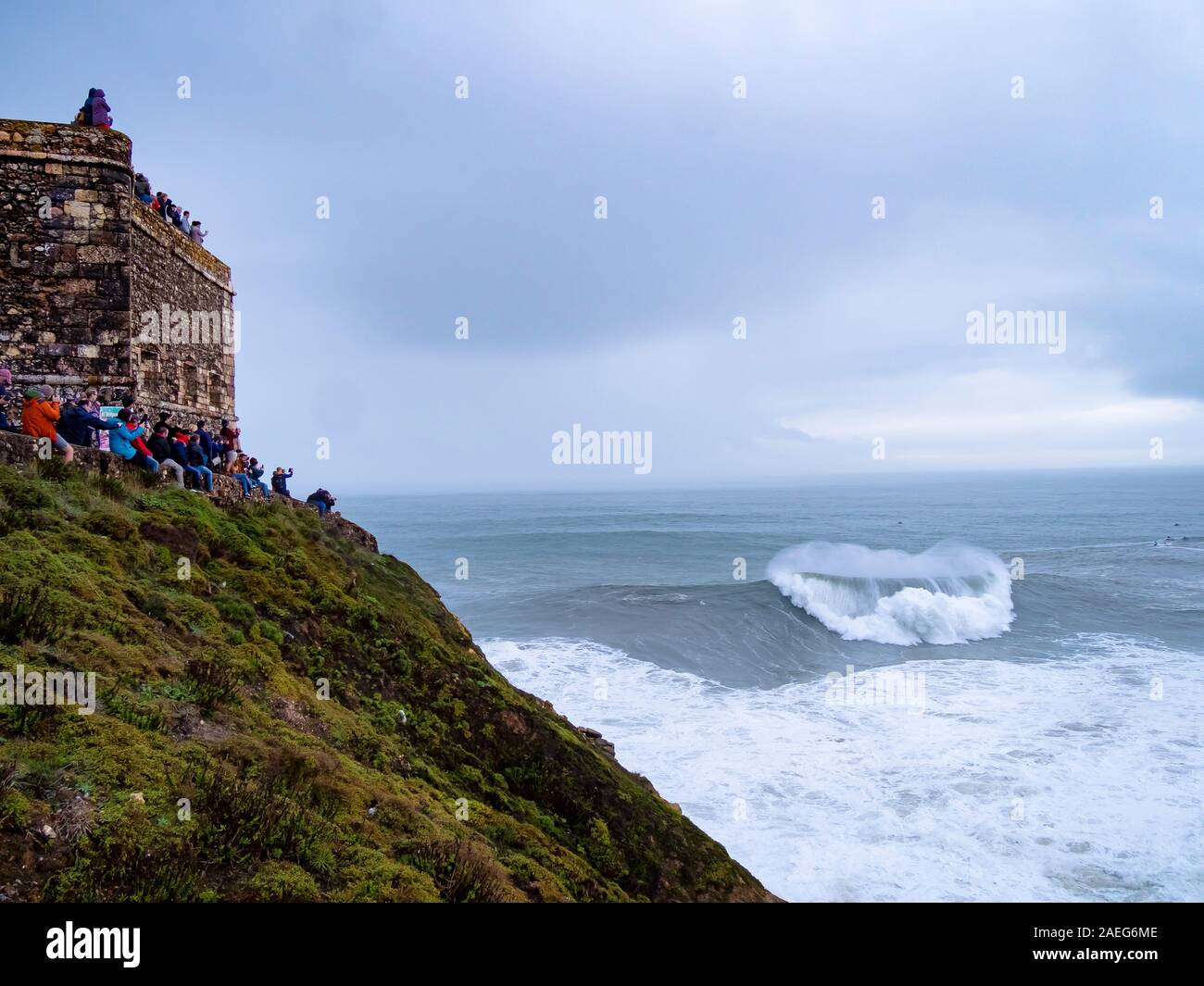 massive waves as seen from Nazare Lighthouse in Nazare, Portugal Stock Photo