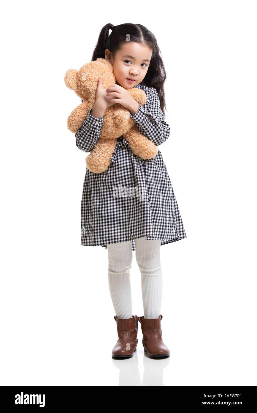 Happy little girl with teddy bear Stock Photo - Alamy