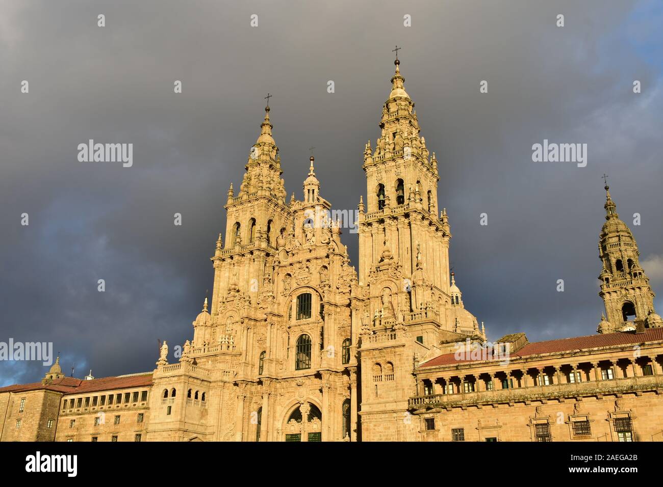 Cathedral with sunset light on a rainy day. View from Praza do Obradoiro. Santiago de Compostela, Spain. Stock Photo