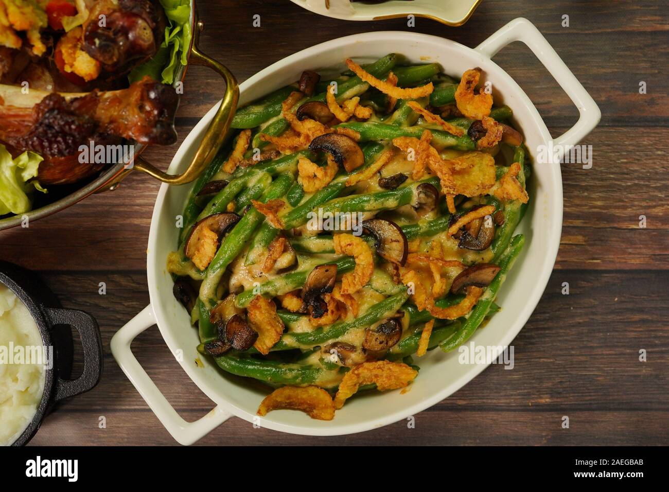 Homemade Green bean Casserole topped with crispy fried onions, overhead