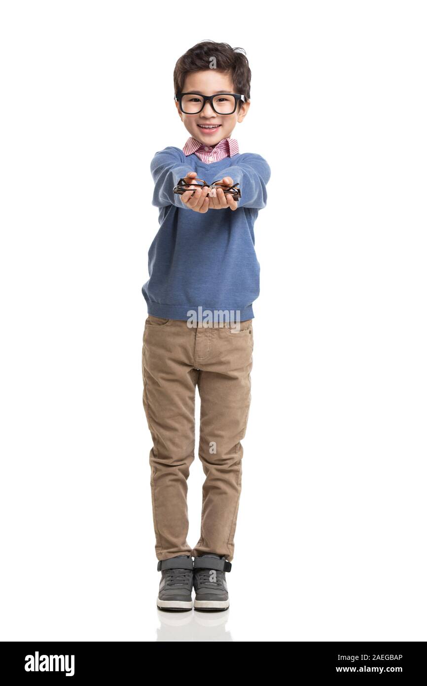 Happy little boy wearing glasses Stock Photo Alamy