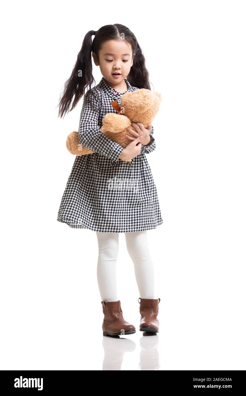 Happy little girl with teddy bear Stock Photo - Alamy
