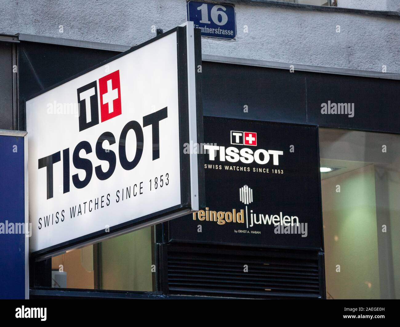 VIENNA, AUSTRIA - NOVEMBER 6, 2019: Tissot logo on their jewelry boutique in Vienna. Tissot is a Swiss luxury watchmaker famous for chronographs and w Stock Photo