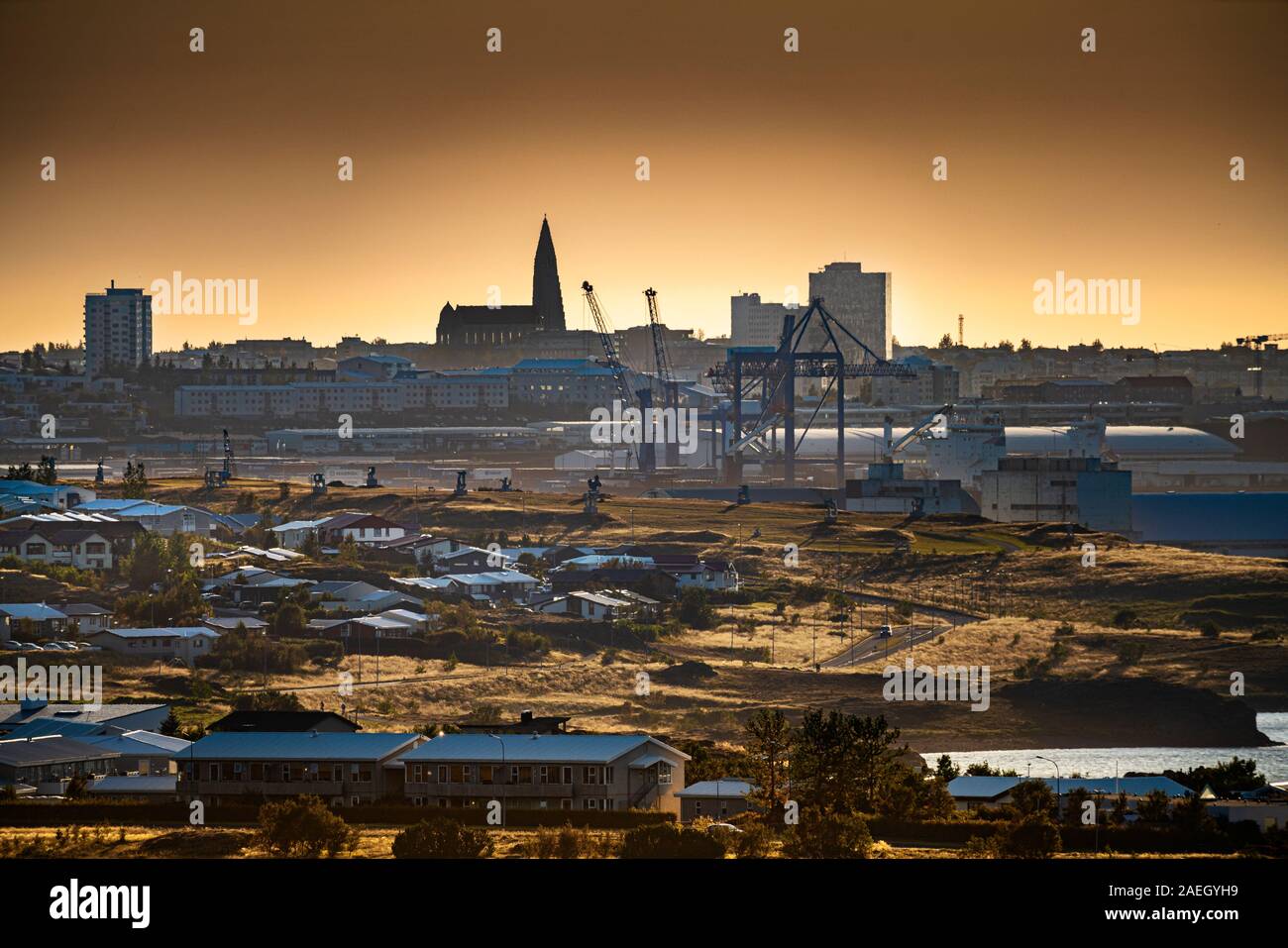 Sundahofn harbour and surrounding neighborhoods, Hallsgrimskirkja Church in the background, Reykjavik, Iceland Stock Photo