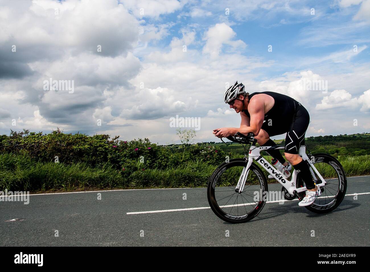 triathlete during cycle leg of a triathlon Stock Photo Alamy