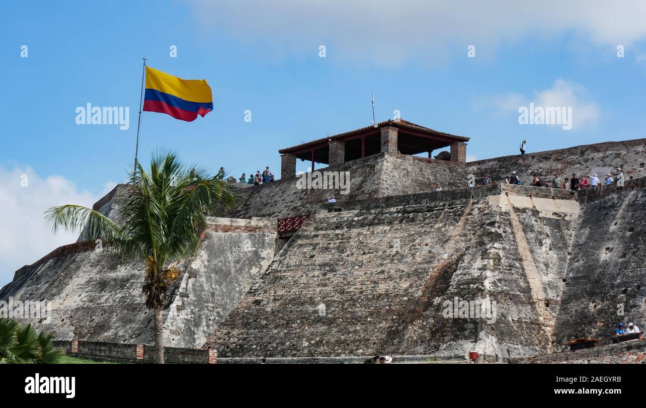 Close up of Fortress in the city of Cartagena called Castillo San Felipe de Barajas with open flag of Colombia as background Stock Photo